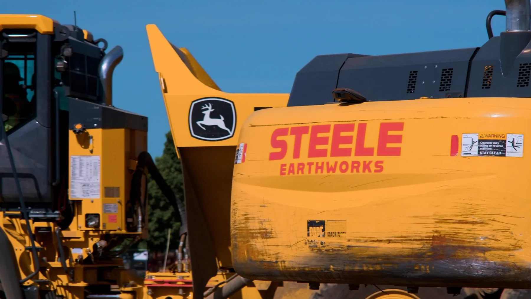 A Steele Earthworks branded wheel loader on a Central Oregon site